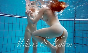 Milana and katrin disrobe eachother underwater
