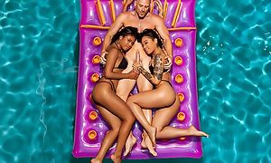 Two exotic beauties share bald-headed guy in FFM threesome