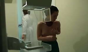 Brazilian Actress Has Her Breasts Squeezed for Mammography, Breast Self Exam and Biopsy