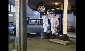 High class woman fucked by mechanics in garage